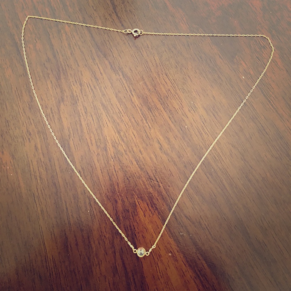 Small stone, clear with silver chain